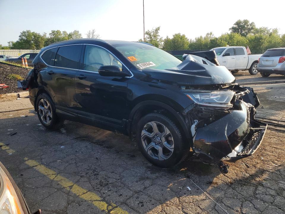 Photo 4 from auction – 2017 HONDA CR-V with VIN 2HKRW2H57HH622692