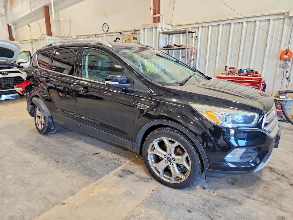 Photo 4 from auction – 2017 FORD ESCAPE with VIN 1FMCU0J92HUB62419