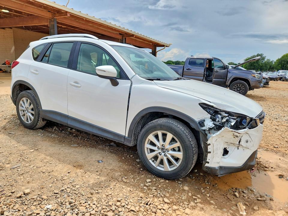 Photo 4 from auction – 2016 MAZDA CX-5 with VIN JM3KE2BY4G0775718