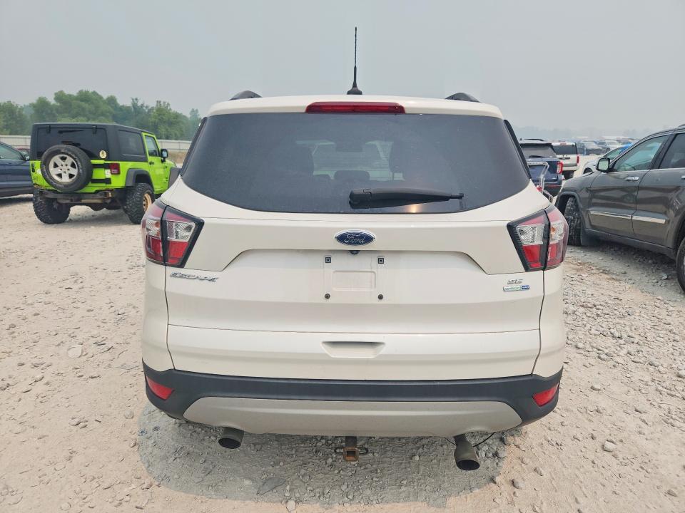 Photo 6 from auction – 2018 FORD ESCAPE with VIN 1FMCU9GD7JUC86062