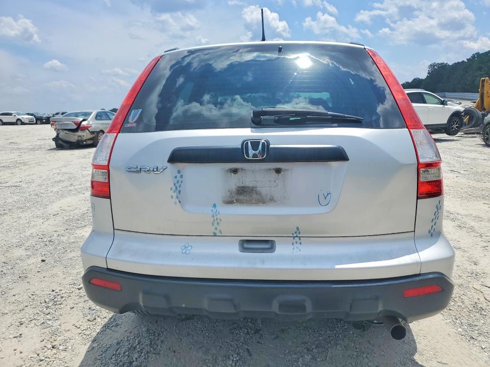 Photo 6 from auction – 2009 HONDA CR-V with VIN 5J6RE38329L028574