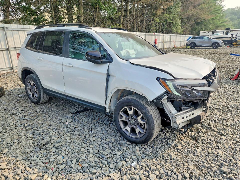 Photo 4 from auction – 2022 HONDA PASSPORT with VIN 5FNYF8H62NB007808