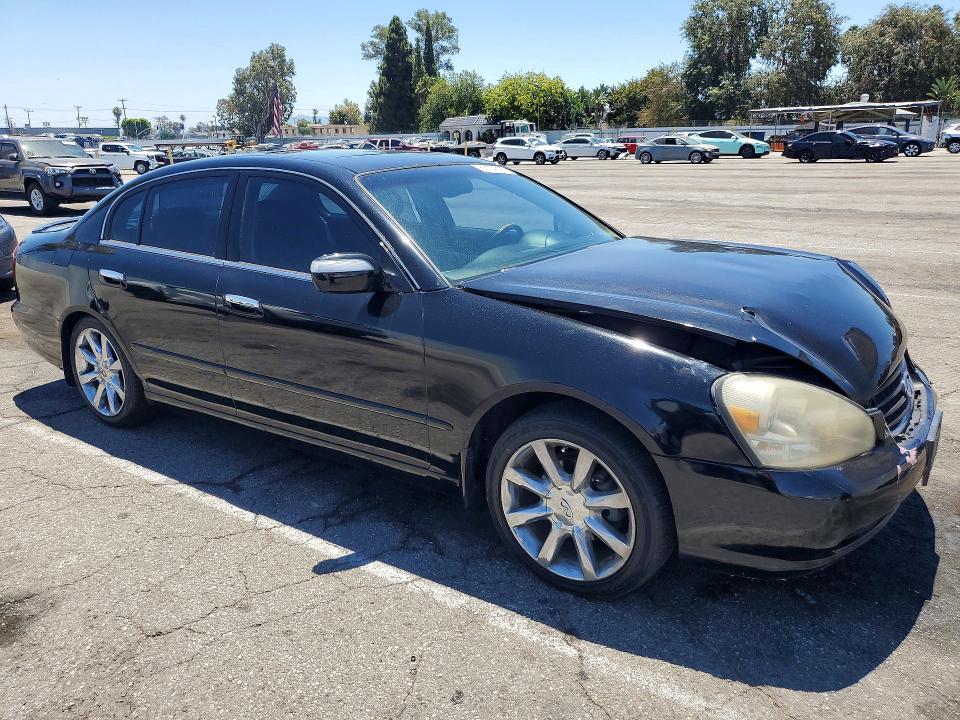 Снимка 4 от търг – 2002 INFINITI Q45 с VIN JNKBF01A62M005079