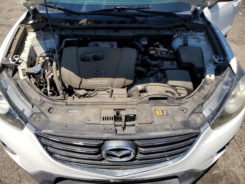 Photo 11 from auction – 2016 MAZDA CX-5 with VIN JM3KE2CY9G0689061