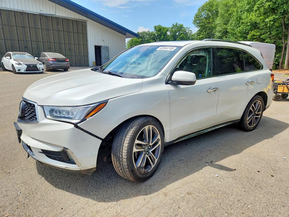 ACURA MDX 2018 with VIN 5J8YD4H81JL009574 - Photo from auction