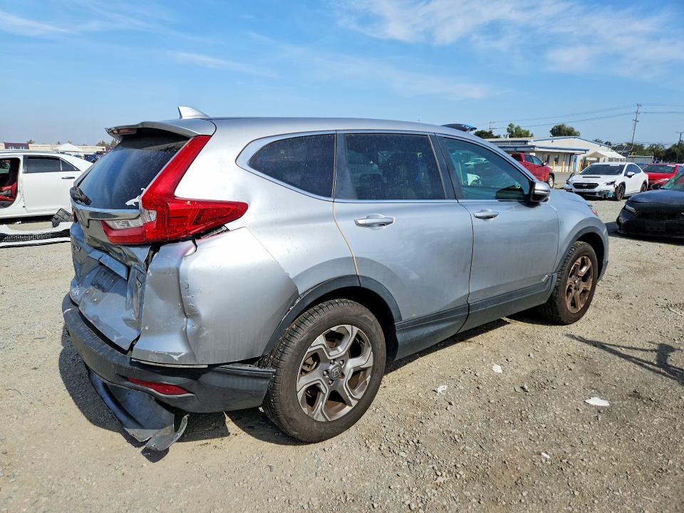 Photo 3 from auction – 2017 HONDA CR-V with VIN 2HKRW2H82HH625073