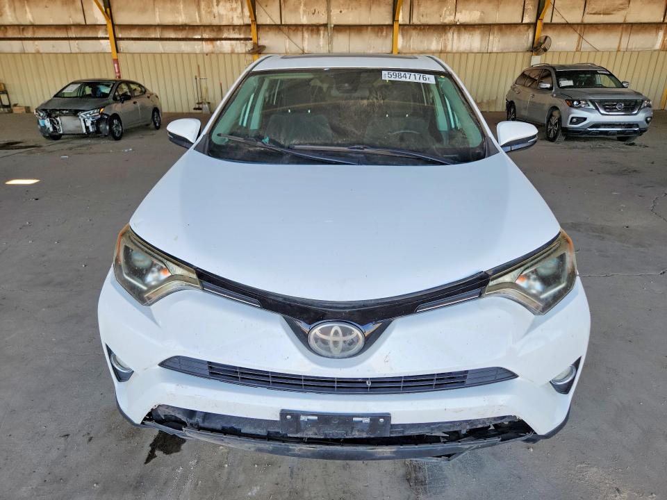 Photo 5 from auction – 2018 TOYOTA RAV4 with VIN 2T3WFREV7JW473232