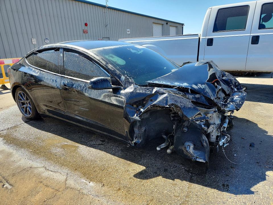 Photo 4 from auction – 2022 TESLA MODEL 3 with VIN 5YJ3E1EB2NF207755