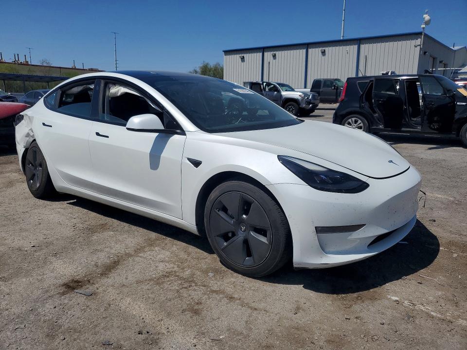Photo 4 from auction – 2021 TESLA MODEL 3 with VIN 5YJ3E1EBXMF037918