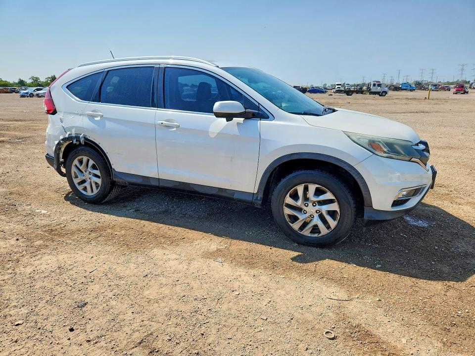 Photo 4 from auction – 2016 HONDA CR-V with VIN 5J6RM4H75GL011132