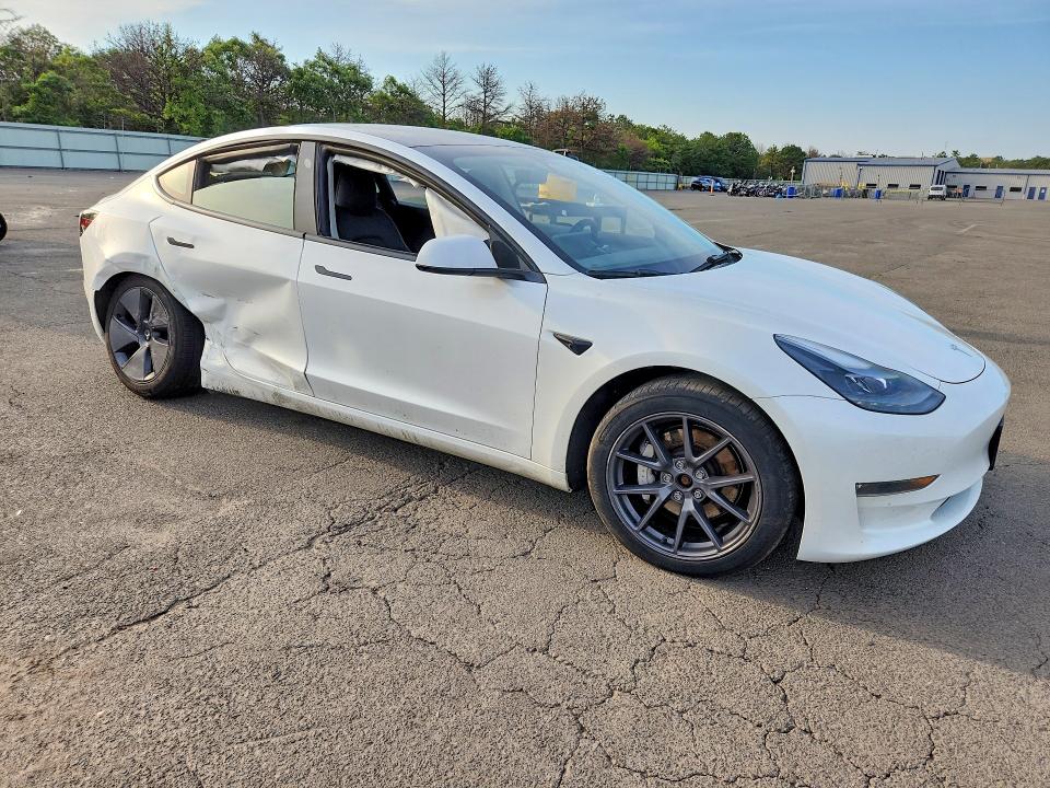 Photo 4 from auction – 2023 TESLA MODEL 3 with VIN 5YJ3E1EB7PF679422