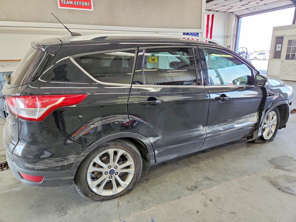 Photo 3 from auction – 2016 FORD ESCAPE with VIN 1FMCU9J90GUC44636