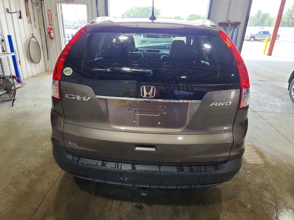Photo 6 from auction – 2014 HONDA CR-V with VIN 2HKRM4H74EH633938