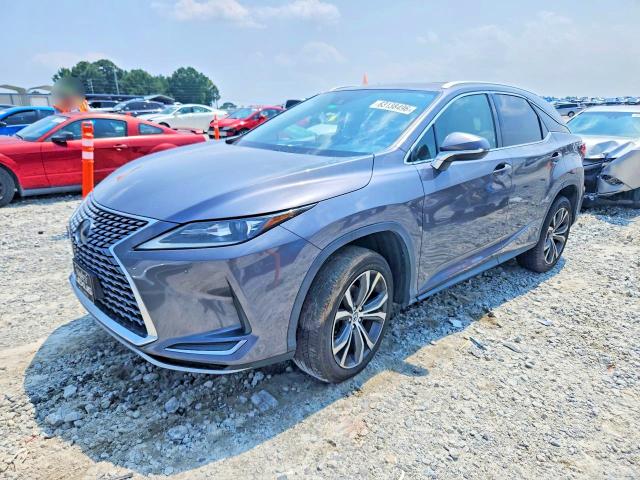 LEXUS RX 2021 with VIN 2T2HZMAA5MC197505 - Photo from auction