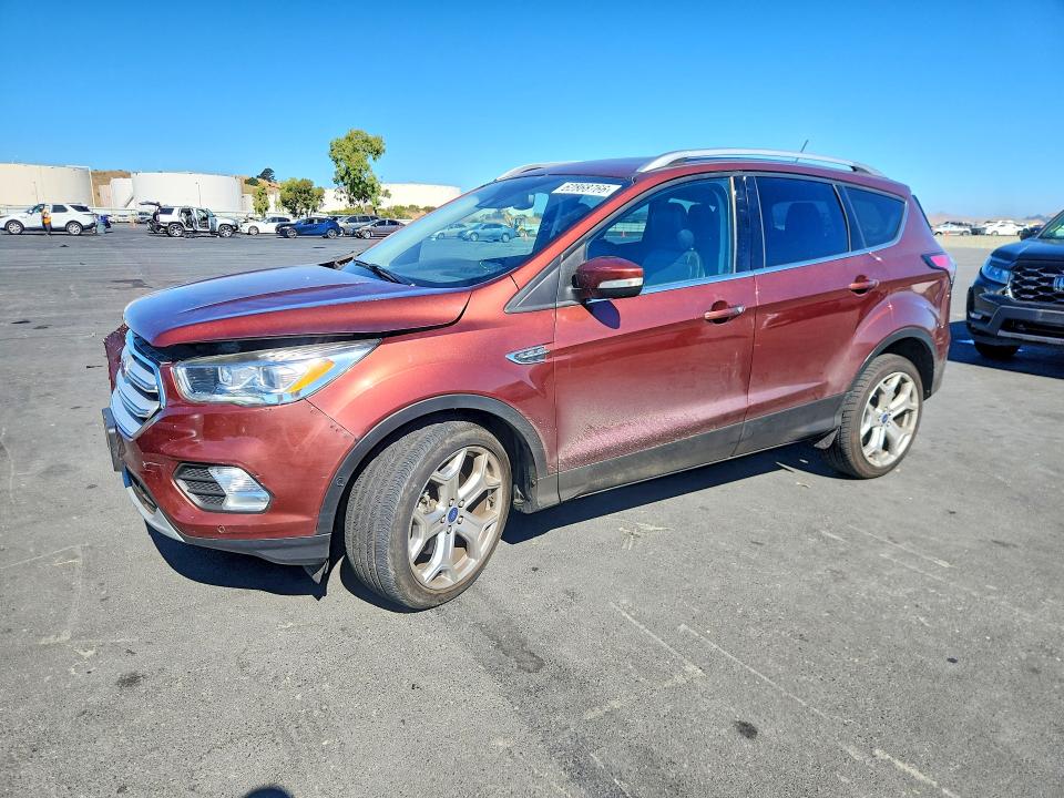 FORD ESCAPE 2018 with VIN 1FMCU9J97JUA56994 - Photo from auction