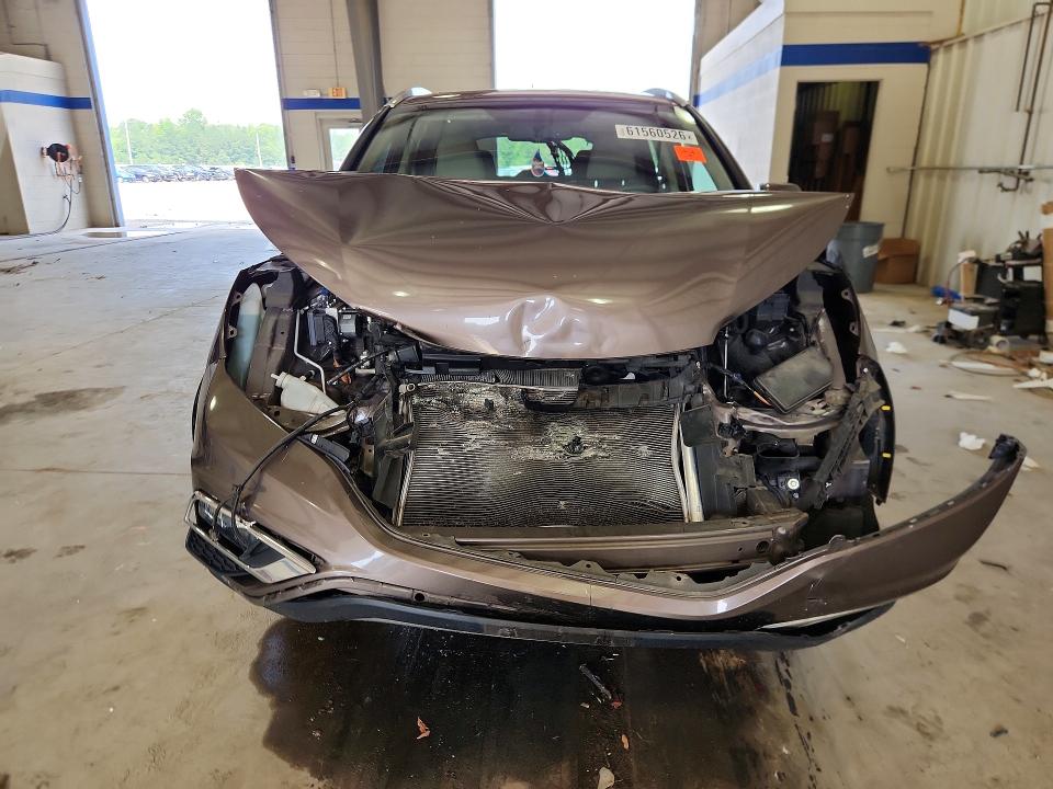 Photo 5 from auction – 2015 HONDA CR-V with VIN 2HKRM3H78FH500126
