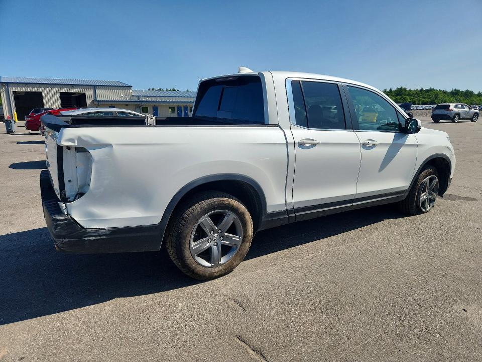 Photo 3 from auction – 2022 HONDA RIDGELINE with VIN 5FPYK3F54NB028840