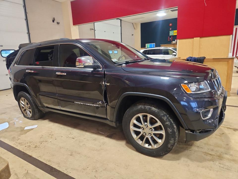 Photo 4 from auction – 2015 JEEP GRAND CHEROKEE with VIN 1C4RJFBG4FC898949