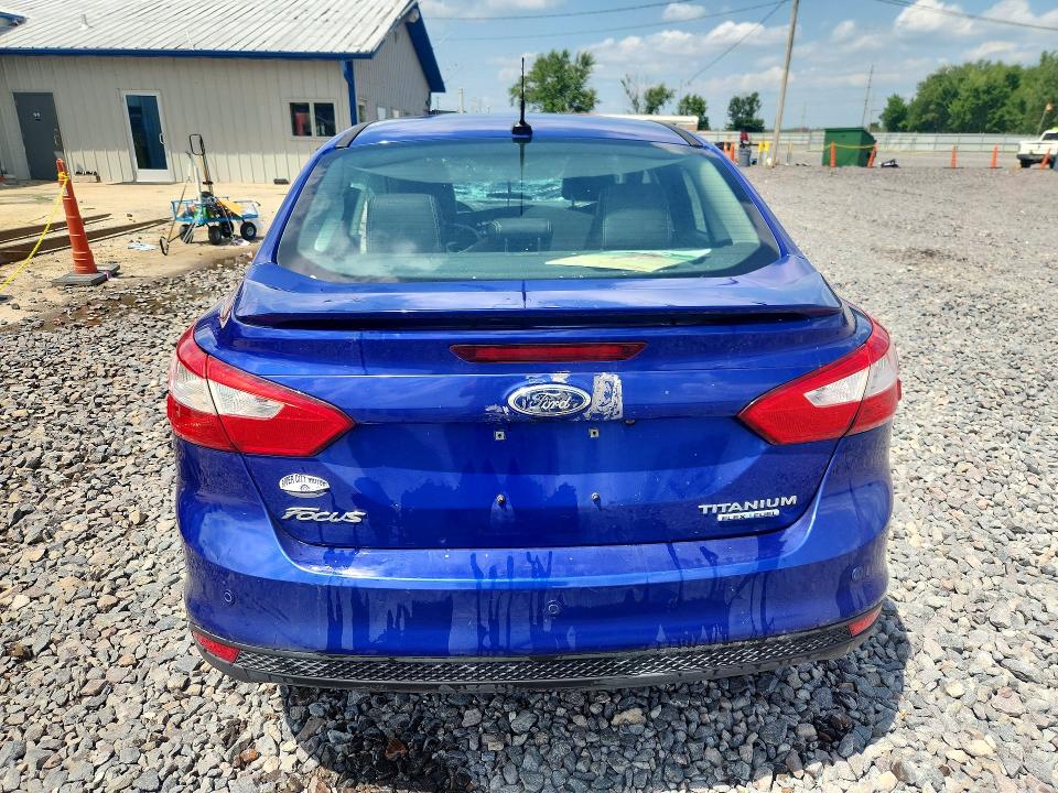 Photo 6 from auction – 2013 FORD FOCUS with VIN 1FADP3J25DL301162