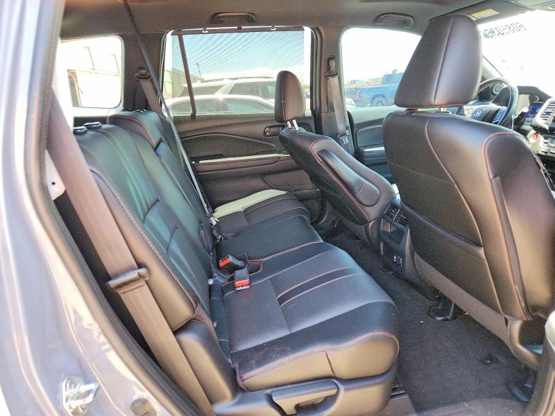 Photo 11 from auction – 2023 HONDA PASSPORT with VIN 5FNYF8H69PB034278