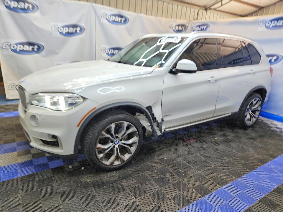 BMW X5 2017 with VIN 5UXKR2C39H0X04885 - Photo from auction