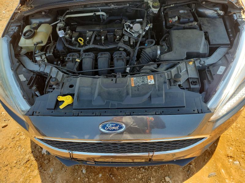 Photo 11 from auction – 2016 FORD FOCUS with VIN 1FADP3F23GL350079