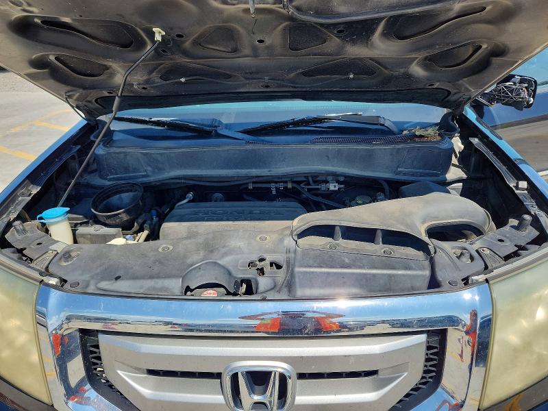 Photo 12 from auction – 2011 HONDA PILOT with VIN 5FNYF4H97BB101827