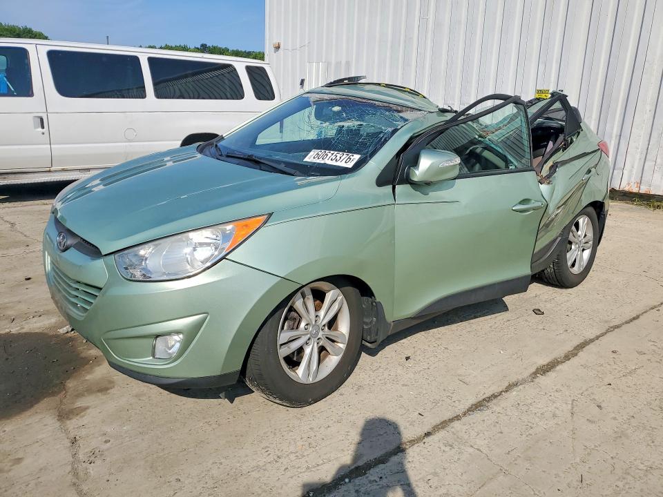 HYUNDAI TUCSON 2013 with VIN KM8JUCAC1DU582610 - Photo from auction