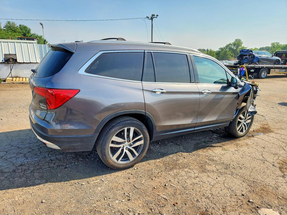 Photo 3 from auction – 2016 HONDA PILOT with VIN 5FNYF6H90GB070164