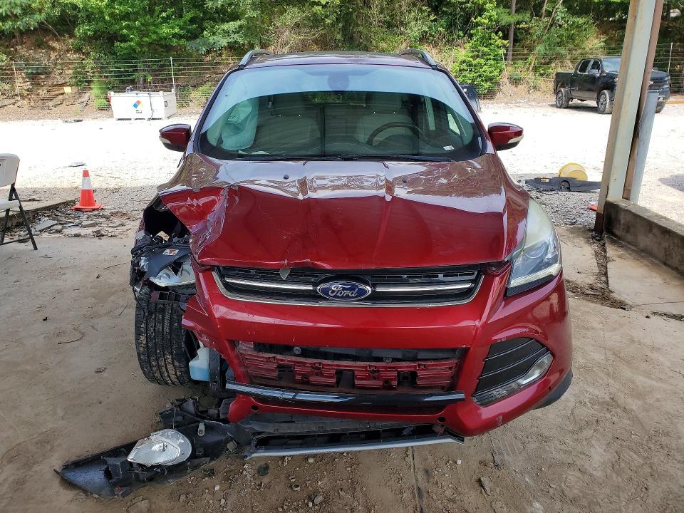 Photo 5 from auction – 2014 FORD ESCAPE with VIN 1FMCU0J94EUD55876