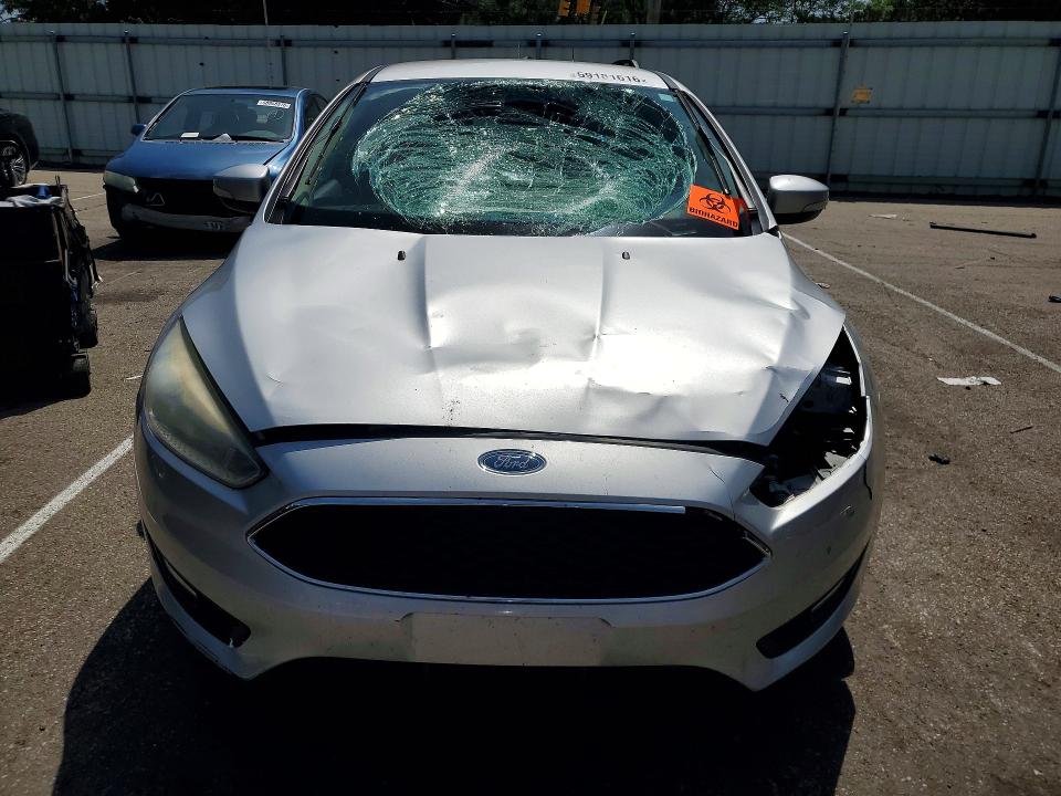 Photo 5 from auction – 2015 FORD FOCUS with VIN 1FADP3F25FL373961