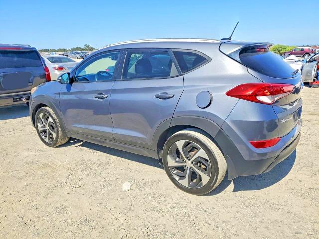 Photo 2 from auction – 2016 HYUNDAI TUCSON with VIN KM8J33A29GU112842
