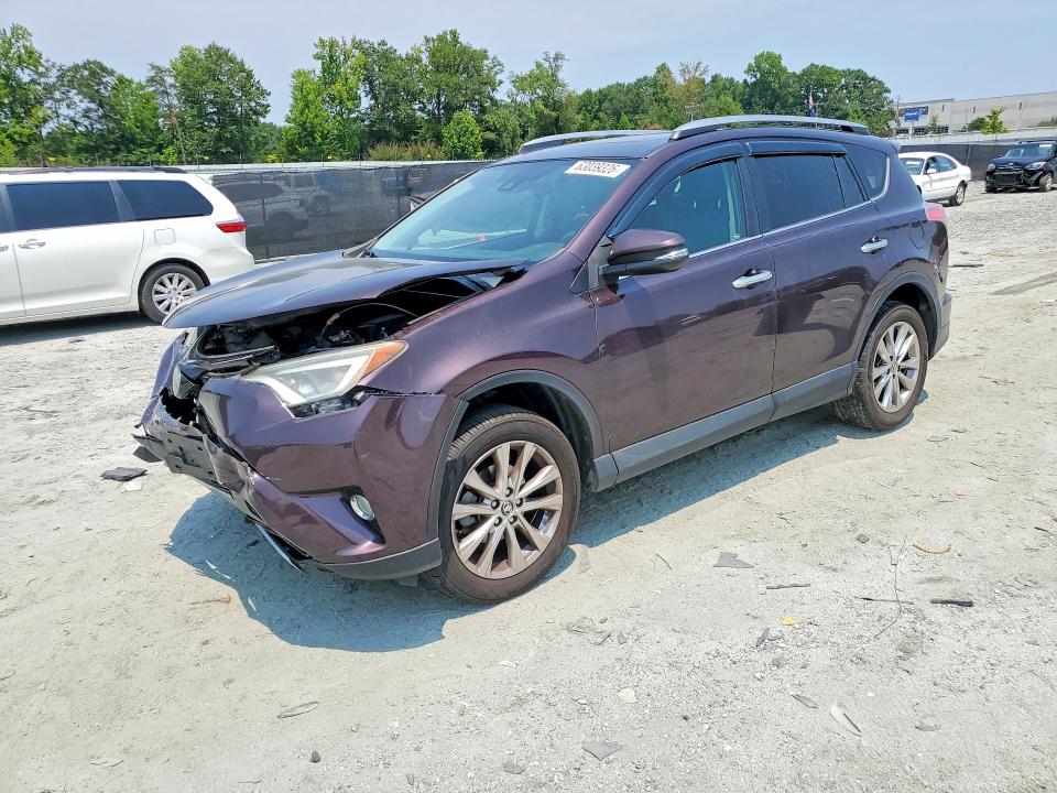 TOYOTA RAV4 2018 z numerem VIN 2T3YFREV3JW415465 - Zdjęcie z aukcji