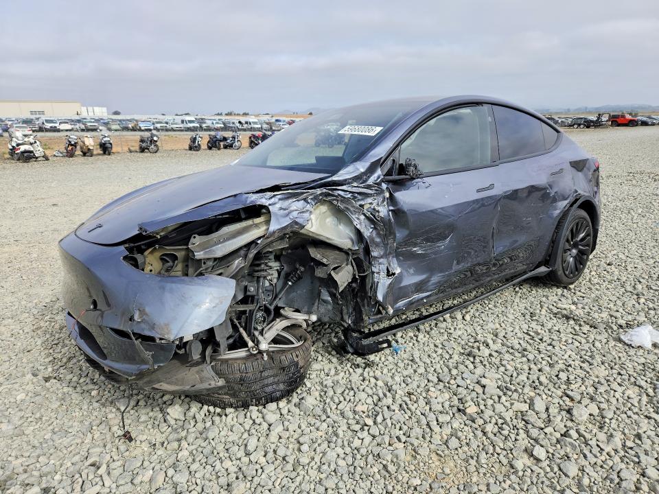 TESLA MODEL Y 2023 with VIN 7SAYGDEE6PF791983 - Photo from auction