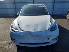 Photo 5 from auction – 2023 TESLA MODEL Y with VIN 7SAYGDEE8PA092660