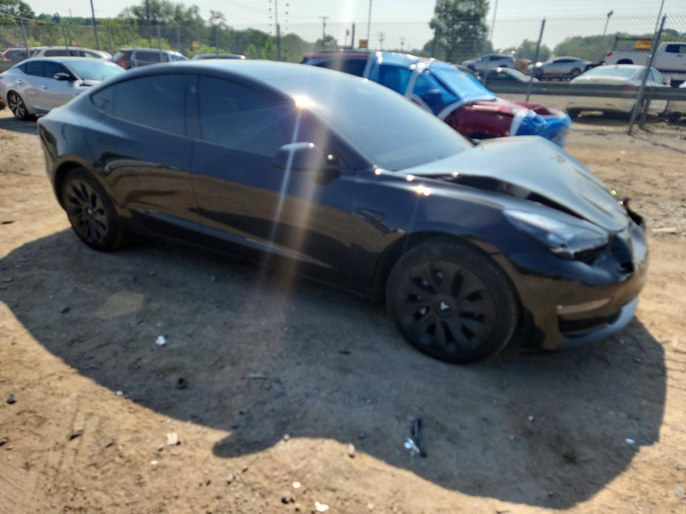 Photo 4 from auction – 2022 TESLA MODEL 3 with VIN 5YJ3E1EB2NF230453
