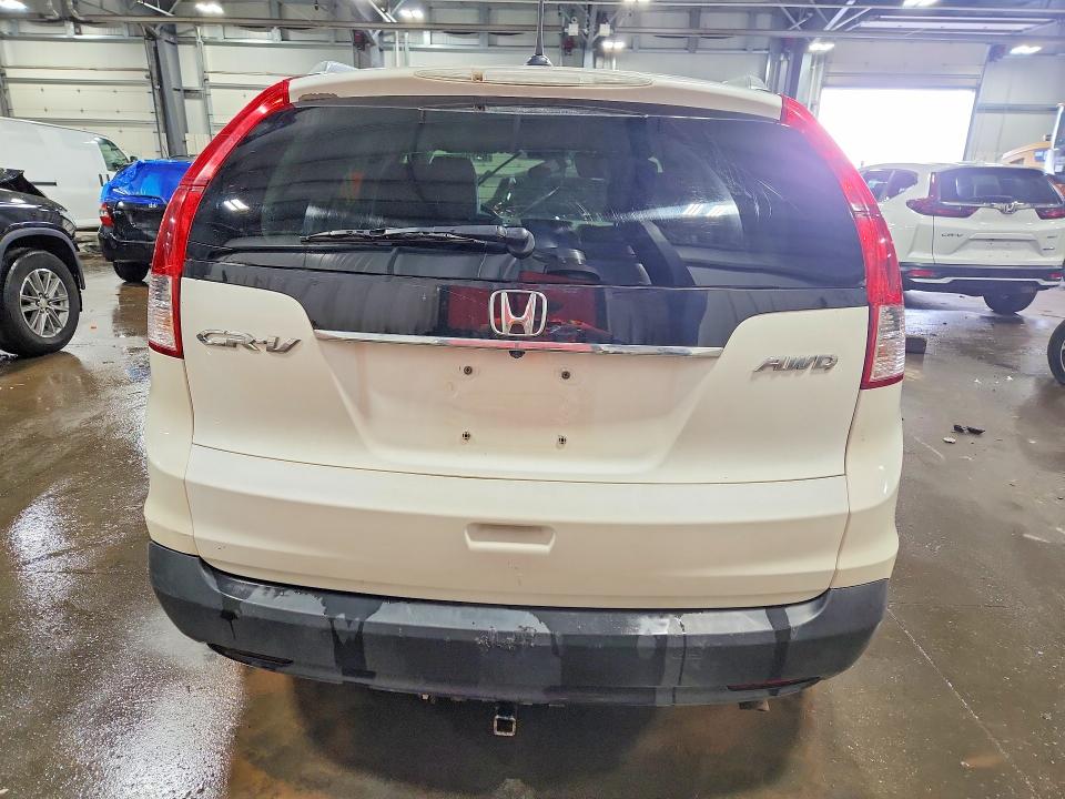 Photo 6 from auction – 2012 HONDA CR-V with VIN 5J6RM4H78CL044023