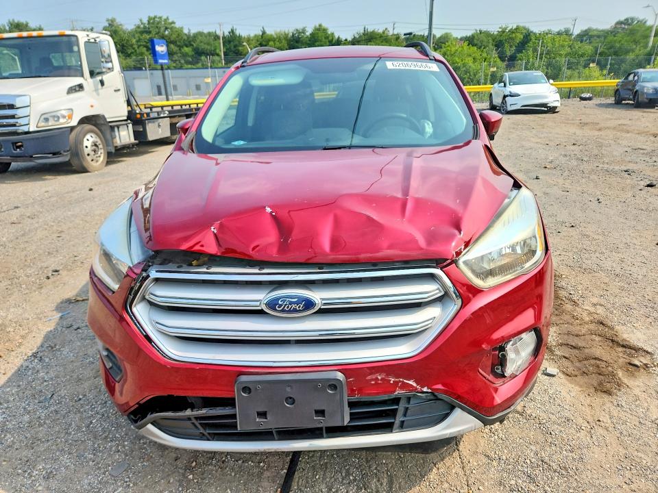 Photo 5 from auction – 2018 FORD ESCAPE with VIN 1FMCU9GD5JUB07324