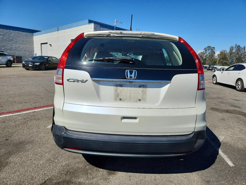 Photo 6 from auction – 2014 HONDA CR-V with VIN 5J6RM3H31EL030359