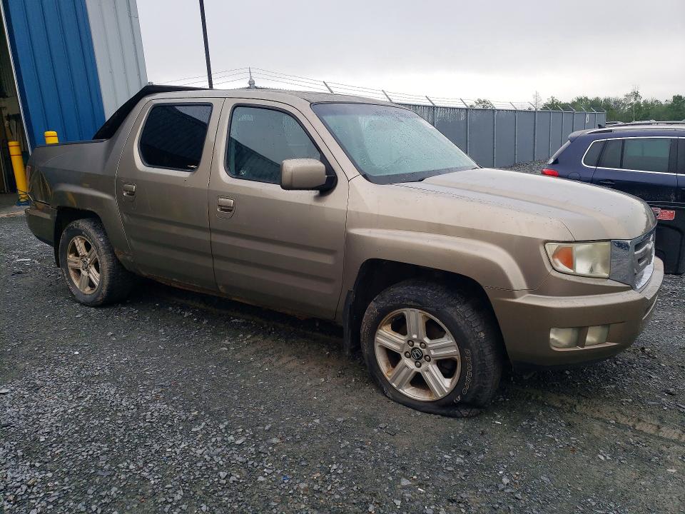 Photo 4 from auction – 2010 HONDA RIDGELINE with VIN 5FPYK1F57AB501449