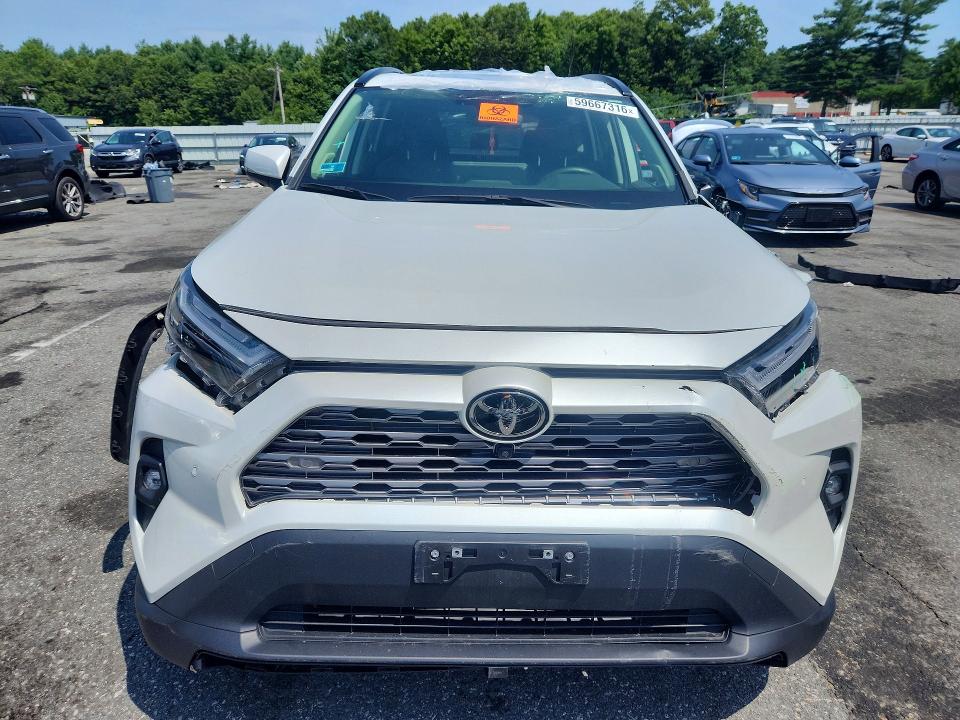 Photo 5 from auction – 2023 TOYOTA RAV4 with VIN JTMN1RFV5PJ041996