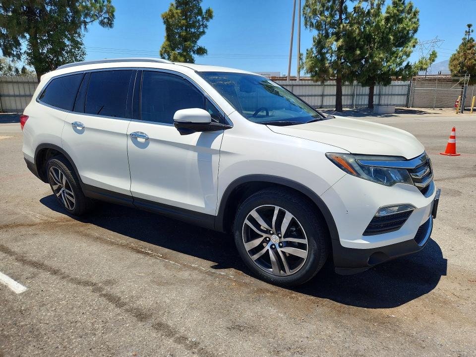 Photo 4 from auction – 2018 HONDA PILOT with VIN 5FNYF5H95JB022628