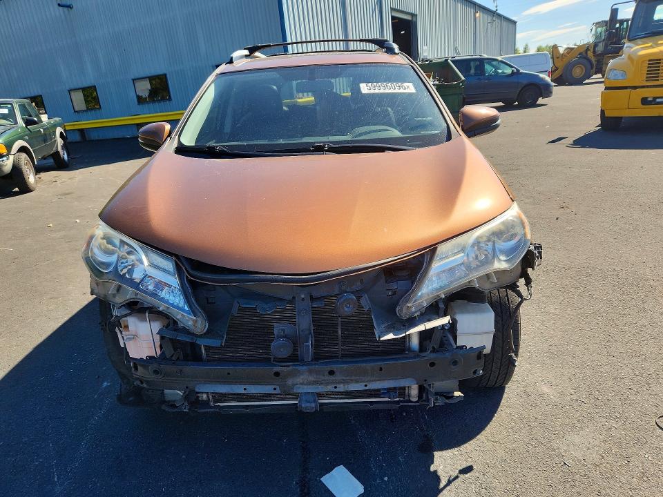 Photo 5 from auction – 2014 TOYOTA RAV4 with VIN JTMRFREV9ED064441