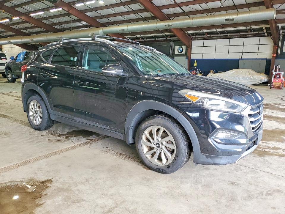 Photo 4 from auction – 2016 HYUNDAI TUCSON with VIN KM8J3CA26GU040563
