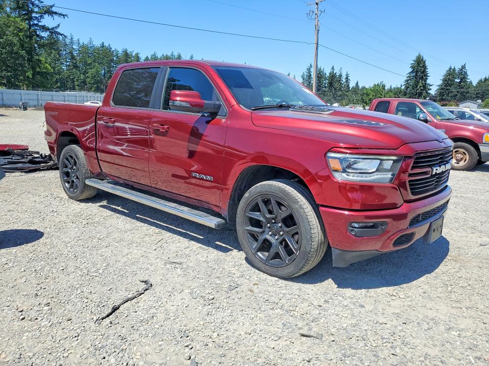 Photo 4 from auction – 2023 RAM 1500 with VIN 1C6SRFJT3PN588877