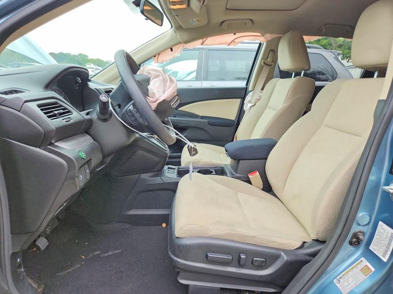 Photo 7 from auction – 2015 HONDA CR-V with VIN 2HKRM4H52FH688498