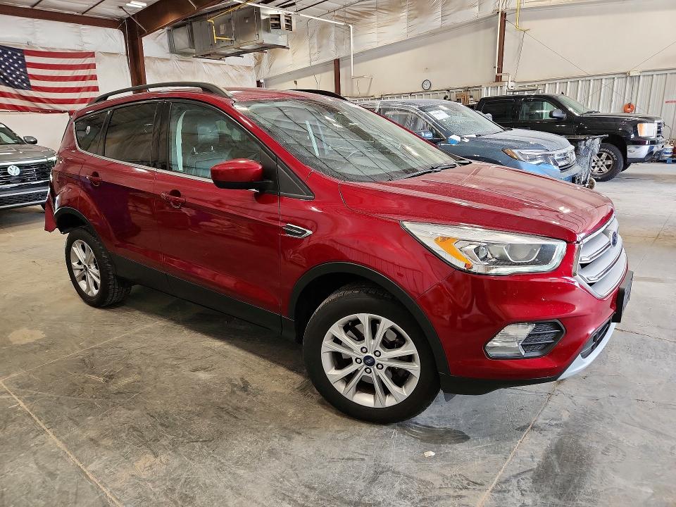 Photo 4 from auction – 2018 FORD ESCAPE with VIN 1FMCU9H91JUB57003