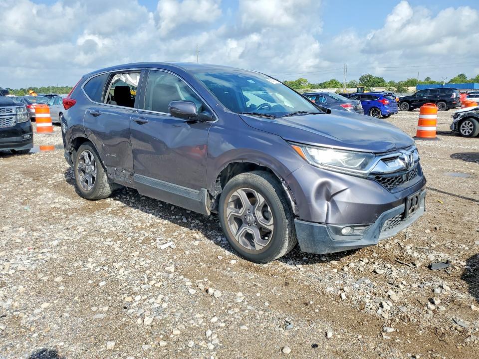 Photo 4 from auction – 2019 HONDA CR-V with VIN 7FARW1H57KE003725