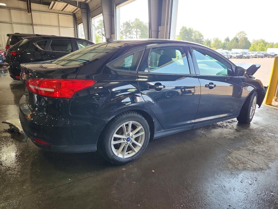 Photo 3 from auction – 2016 FORD FOCUS with VIN 1FADP3F23GL330687