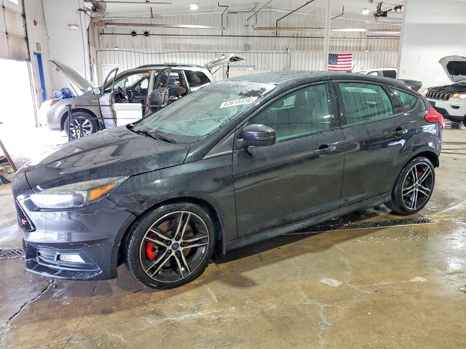 FORD FOCUS 2015 with VIN 1FADP3L94FL372088 - Photo from auction